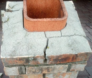 Example of a chimney crown/cap that has gone bad.